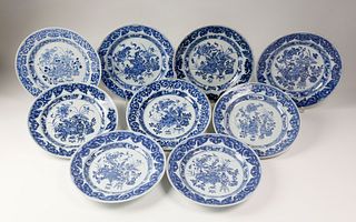 Set Of Nine Chinese Export Porcelain Underglaze Blue Dinner Plates, circa 1700