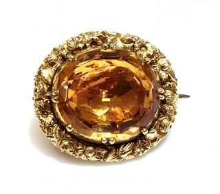 A William IV gold topaz brooch,