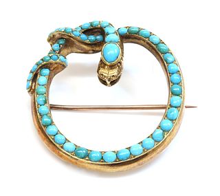 A Victorian gold turquoise set snake brooch/pendant,