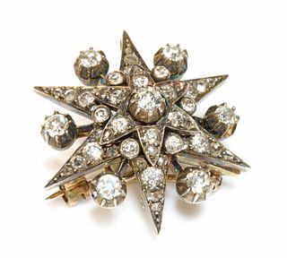 A Victorian diamond set star brooch, c.1890,