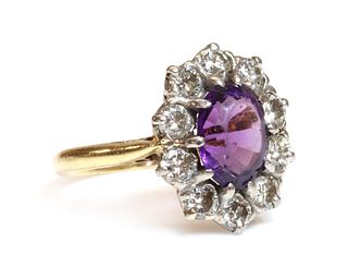 An 18ct gold amethyst and diamond cluster ring, by Arthur & Co., c.1970,
