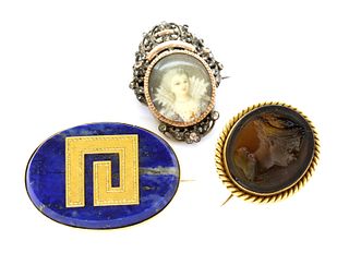 A late Victorian gold mounted Tassie intaglio brooch, by Benzie of Cowes,