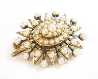 A Victorian gold split pearl oval starburst brooch/pendant, c.1900,