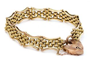 An Edwardian 9ct gold gate bracelet,