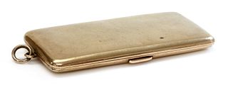 A 9ct gold rectangular cigarette case, by Cohen and Charles,