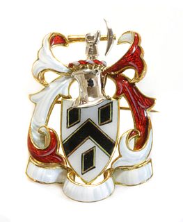 An 18ct two colour gold polychrome enamel coat of arms brooch, by Garrard & Co., c.1990,