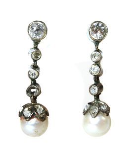 A cased pair of early 20th century pearl and diamond drop earrings,