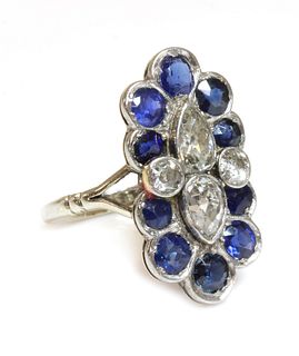 A diamond and sapphire fingerline cluster ring, c.1935,