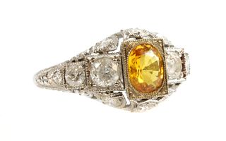 An Art Deco style yellow sapphire and diamond ring,