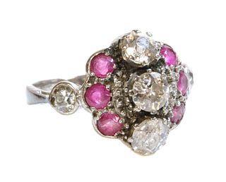 A white gold diamond and ruby cluster ring, c.1935,