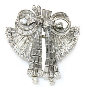 A diamond set double clip waterfall brooch/pendant, c.1945,