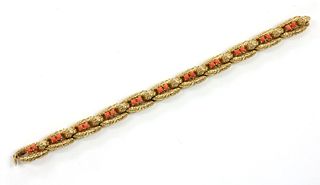 A gold coral set bracelet and ring suite, by Cartier Paris,