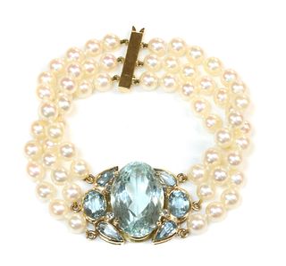 A 9ct gold aquamarine and cultured pearl bracelet, by Cassandra Goad, c.1998,