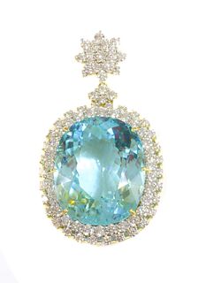 An 18ct gold Paraiba tourmaline and diamond pendant,