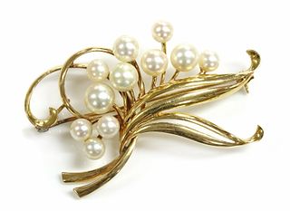 A gold and cultured pearl spray brooch, by Mikimoto,