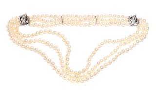 A three row cultured pearl necklace and bracelet suite,