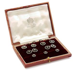 A cased 9ct white gold onyx and split pearl gentlemen's dress set, by S.J. Rose,
