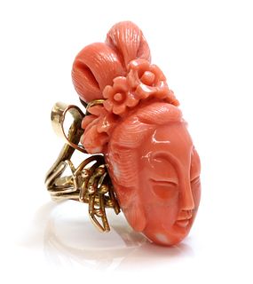 An Asian carved coral ring,