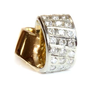 A Continental diamond set two colour ring,