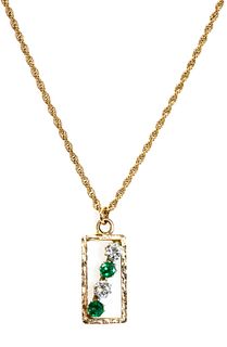 A gold diamond and emerald pendant, c.1970,