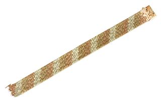 A 9ct three colour gold five row brick link bracelet, by Wristwear, c.1970,