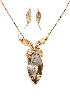 An 18ct two colour gold smoky quartz and diamond necklace and earring suite, c.1990,
