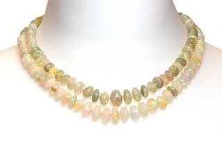 A two row graduated opal bead necklace,