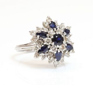 A white gold sapphire and diamond snowflake cluster ring,