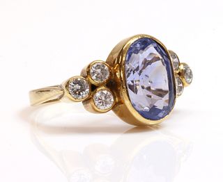 An 18ct gold single stone sapphire ring,