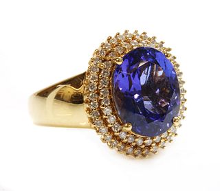 An 18ct gold tanzanite and diamond cluster ring,