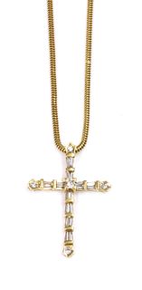 A Latin style diamond set cross and chain,