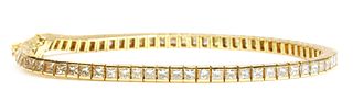 A Continental gold diamond set line bracelet,