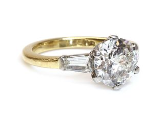 A single stone diamond ring with a jubilee crown cut diamond,