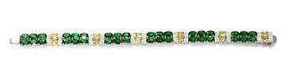 A white gold two row chrome diopside, yellow sapphire and diamond line bracelet,