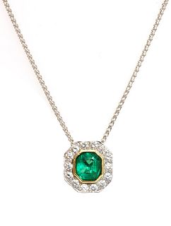 A two colour gold emerald and diamond octagonal cluster pendant,