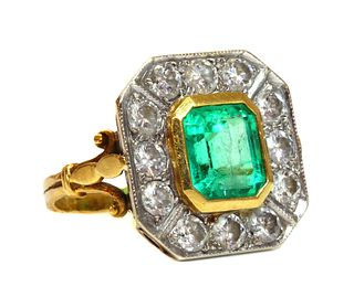 An 18ct gold emerald and diamond octagonal cluster ring,