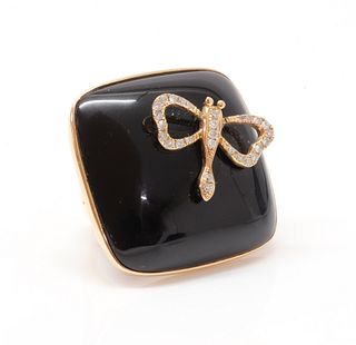 A rose gold onyx and diamond set plaque ring,