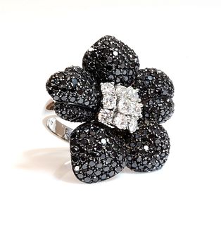 A Continental white and black diamond orchid ring, c.1990,