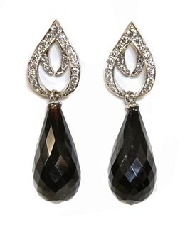 A pair of 18ct white gold diamond and onyx set drop earrings, by Susy Telling,