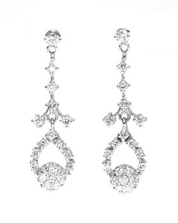 A pair of American diamond set drop earrings,