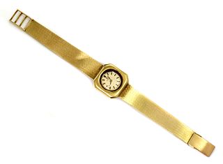 A ladies' 18ct gold Omega mechanical watch movement in an earlier Swiss case and bracelet,
