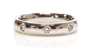 A diamond set wedding ring or gyspy band ring,