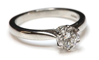 A platinum single stone diamond ring,