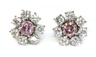 A pair of fancy pink diamond and diamond cluster earrings,