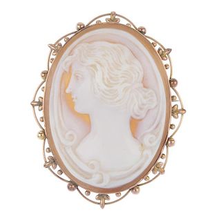 A selection of jewellery. To include an shell cameo brooch, depicting the profile of a lady within a