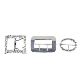 Seven late 19th and early 20th century silver buckles. To include two oval-shape buckles, one of pla