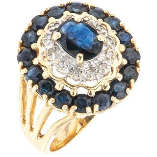 RING WITH SAPPHIRES AND DIAMONDS IN 14K YELLOW GOLD Oval and round cut sapphires~1.80 ct, 8x8 cut diamonds~0.05 ct. Weight:6.9g