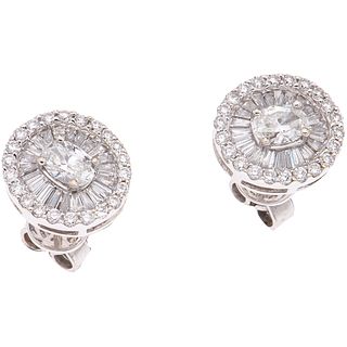 PAIR OF STUD EARRINGS WITH DIAMONDS IN 18K WHITE GOLD 2 Oval cut diamonds ~0.44 ct Clarity: VS2-SI1, different cut diamonds
