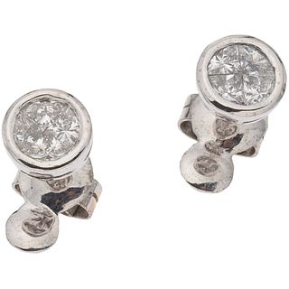 PAIR OF STUD EARRINGS WITH DIAMONDS IN 14K WHITE GOLD Fantasy cut diamonds ~1.05 ct. Weight: 3.3 g