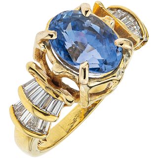 RING WITH SAPPHIRE AND DIAMONDS IN 14K AND 10K YELLOW GOLD 1 Oval cut sapphire ~5.27 ct and Baguette cut diamonds ~0.50 ct